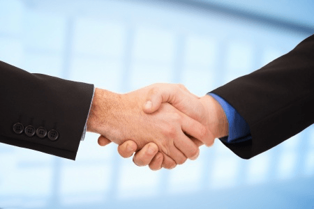 forex trading partner shaking hands business