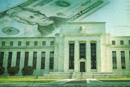 The Federal Reserve building in Washington DC superimposed on a twenty dollar bill and a grunge texture background